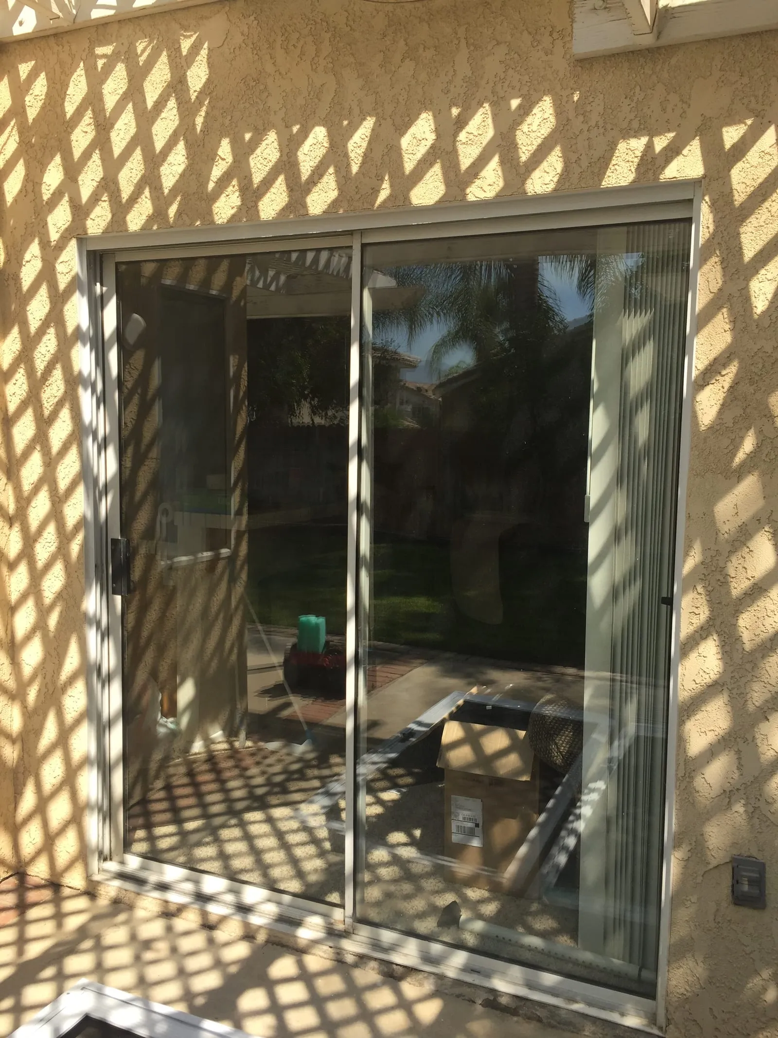 A bare sliding window before the security screen was installed